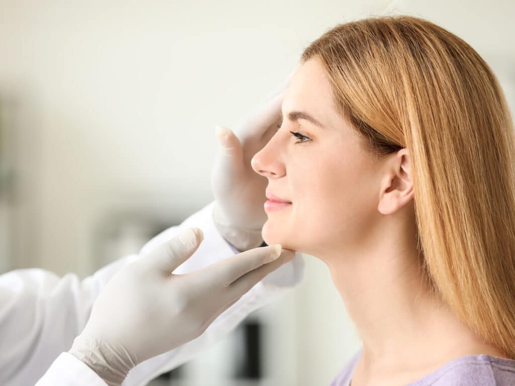 A board-certified plastic surgeon will assess your facial features and create a tailored treatment plan to ensure the best outcome in secondary rhinoplasty surgery.