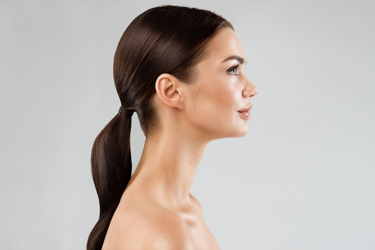 woman after her rhinoplasty in Miami, FL