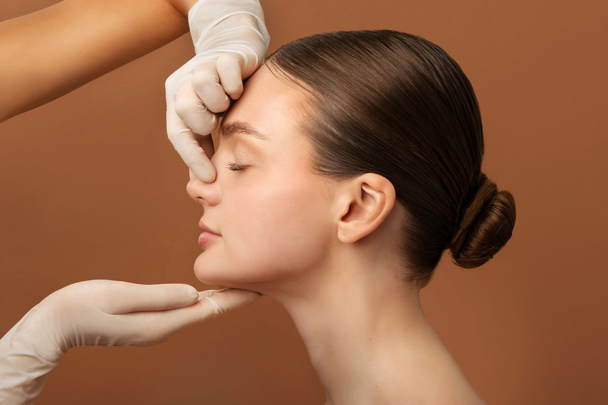 woman in Miami, FL, after her revision rhinoplasty